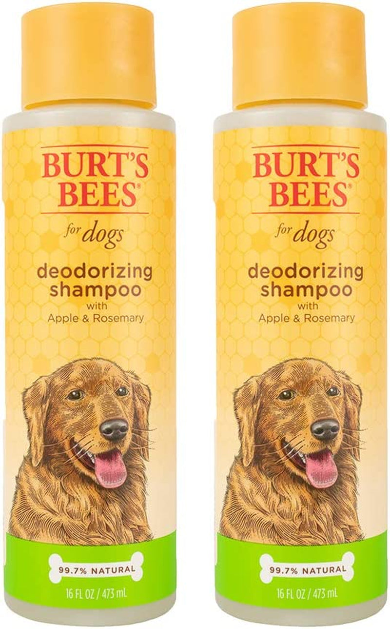 Two bottles of Burt's Bees for Pets Deodorizing Dog Shampoo with apple and rosemary