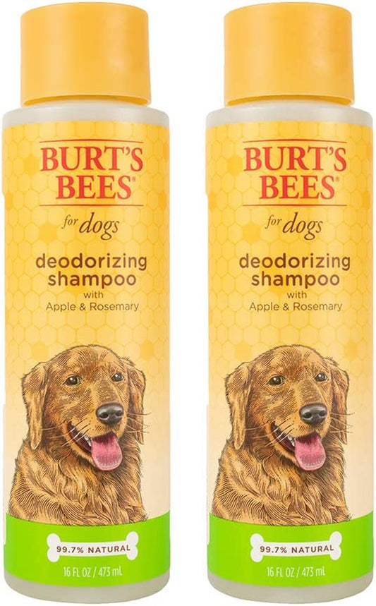 Two bottles of Burt's Bees for Pets Deodorizing Dog Shampoo with apple and rosemary